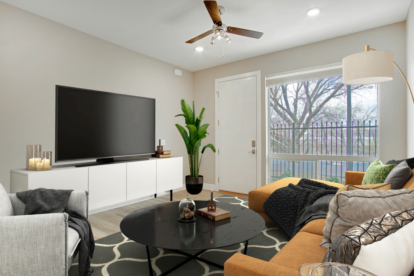 Living room with tv, sofa, and ceiling fan rendering