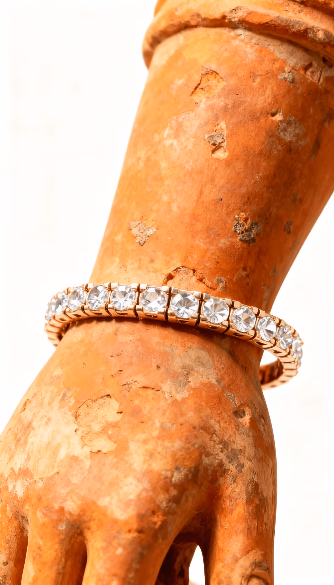 Bracelet on clay arm