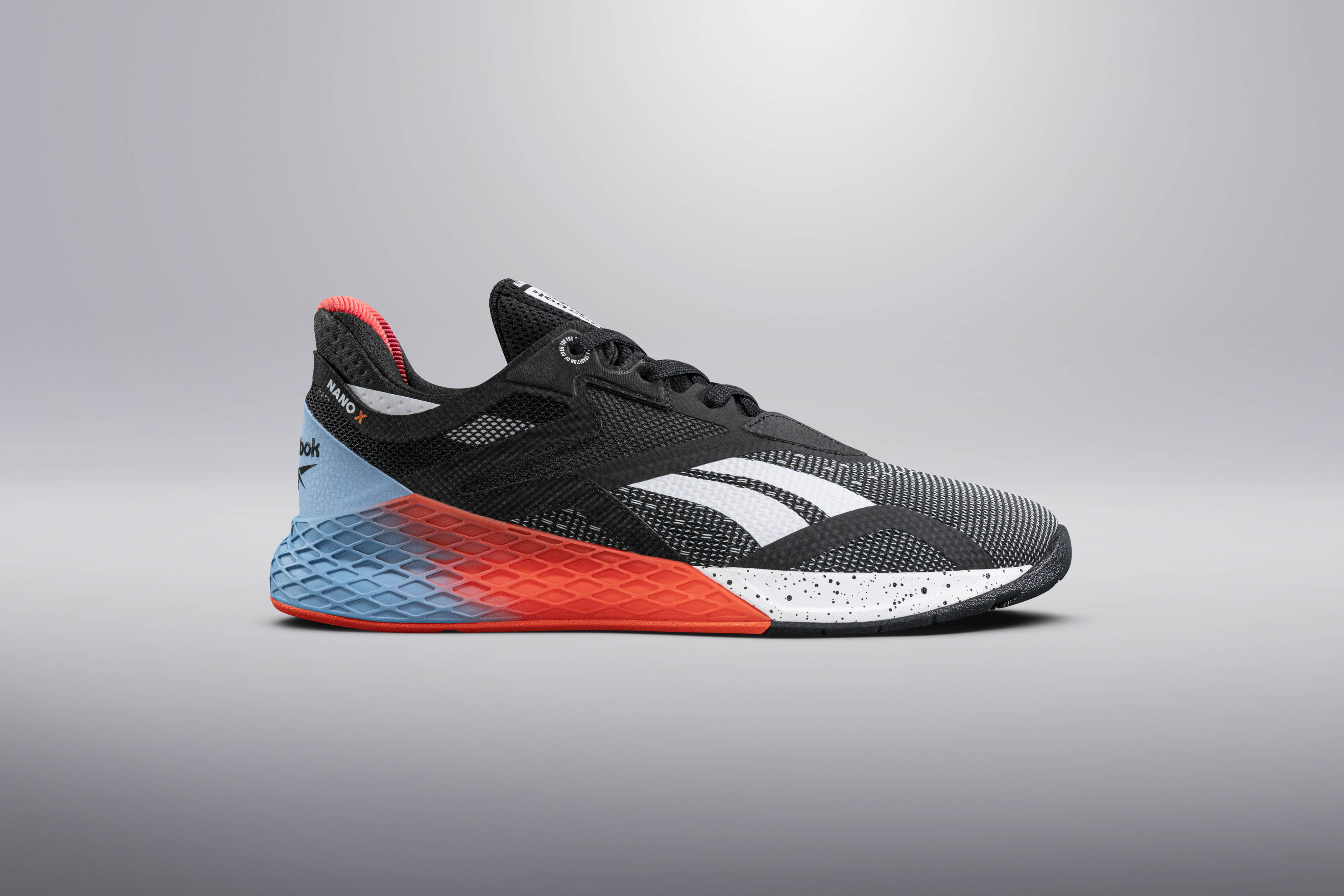 Reebok Nano X SS20 cross-training shoe in black, white, and red colorway, studio product shot.