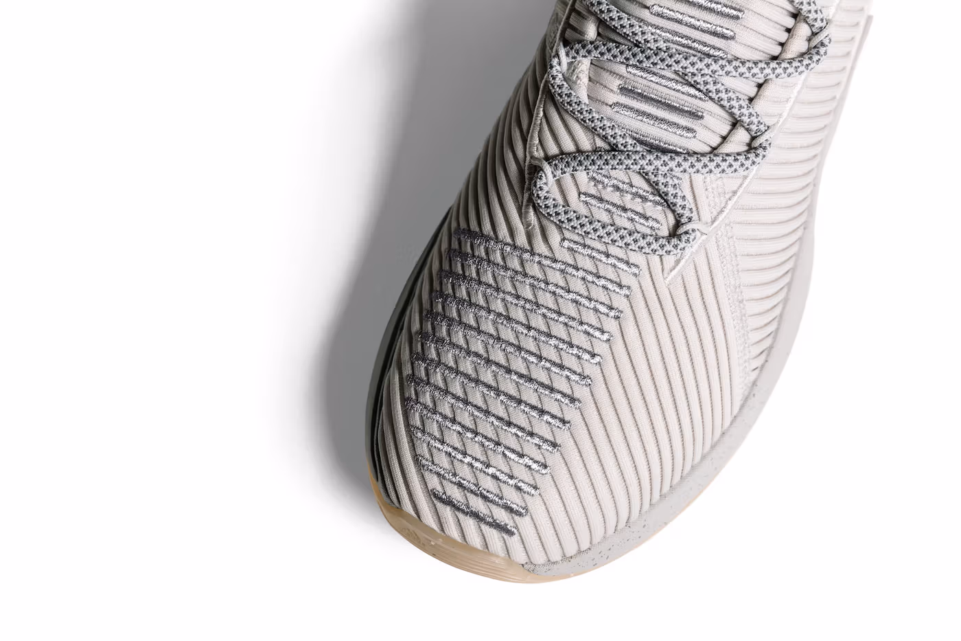 Close-up of the adidas D Rose 9 toe box showing knit texture and stitched detailing