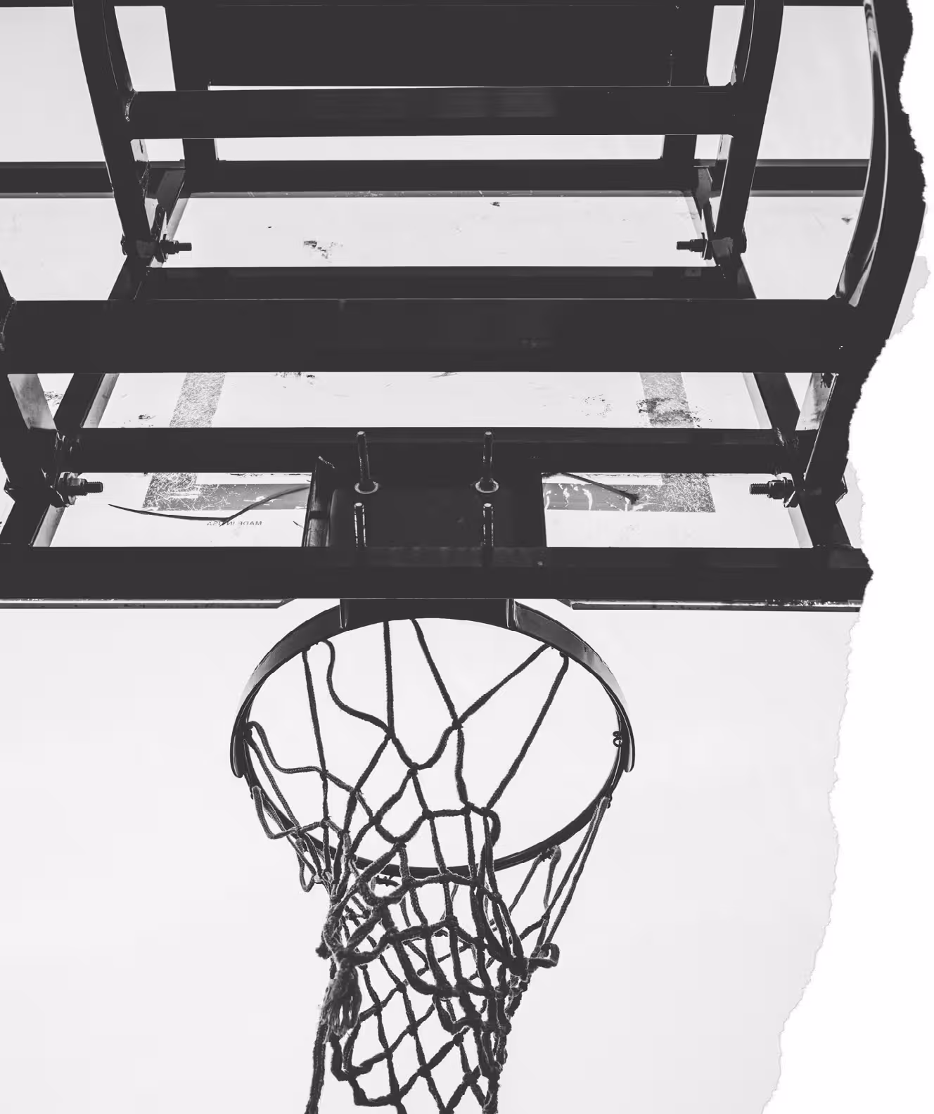 Low-angle photo of an outdoor basketball hoop and net, adidas D Rose 9 campaign