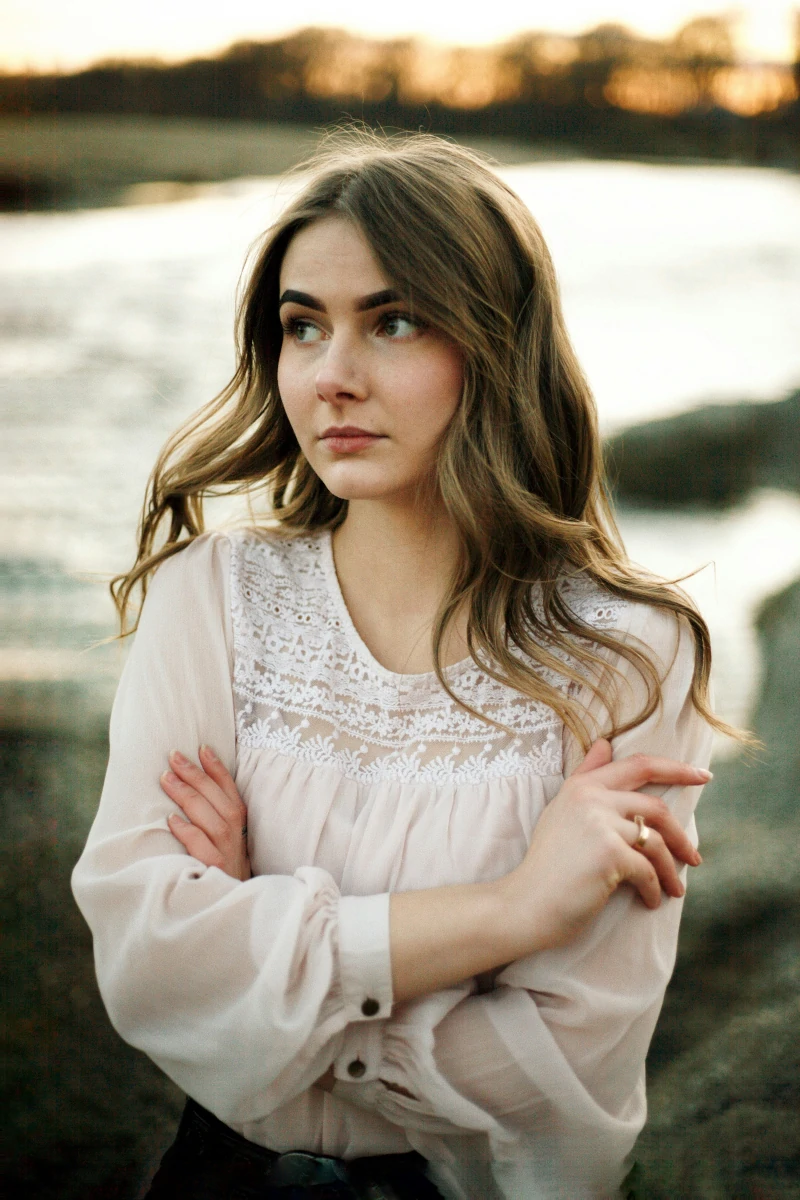 Women in white lace top - aftershock london