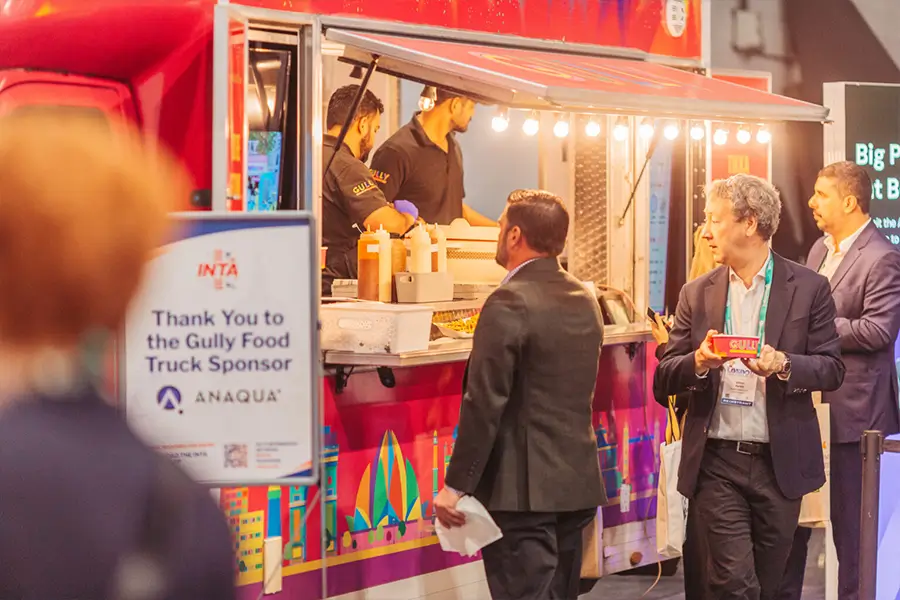 Delegates visiting the branded Anaqua food truck activation
