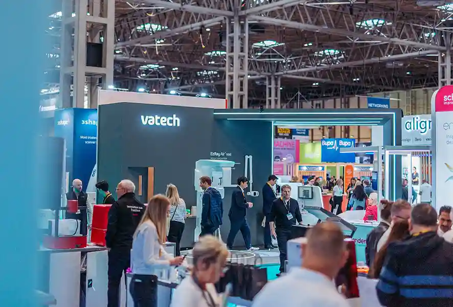 Vatech stand with large scale mahinery, LED features and overarching structures