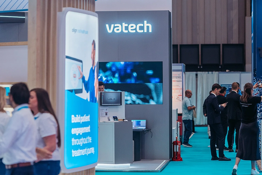 Vaech logo from aisle view of exhibition hall