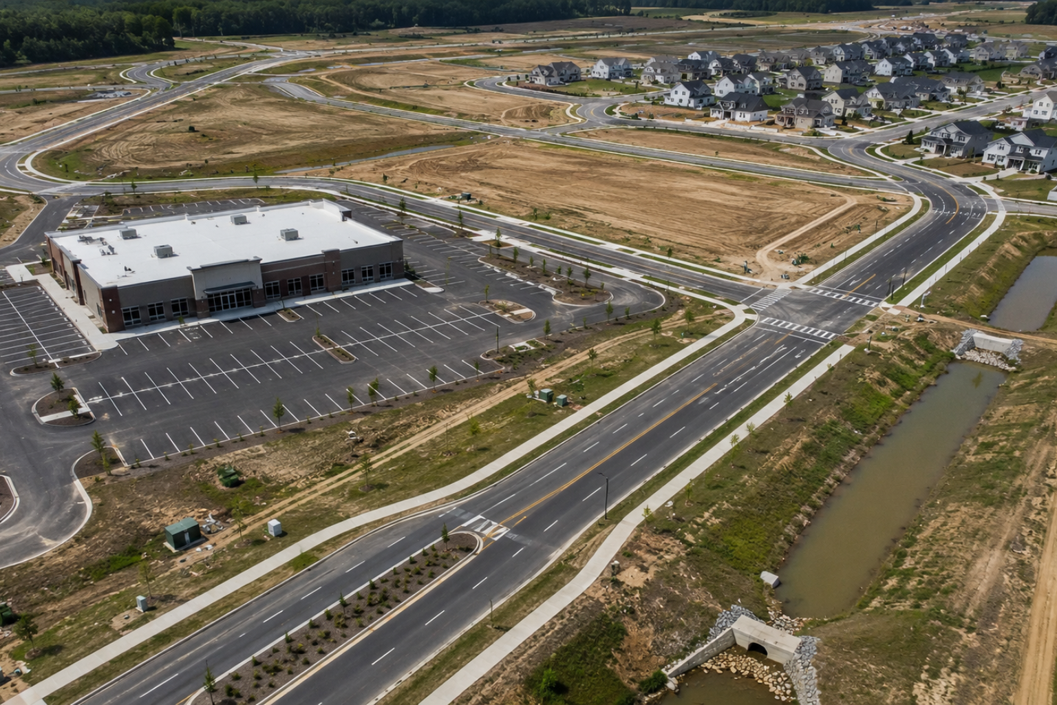 Road construction site featuring pavement subgrade engineering and soil stabilization work.