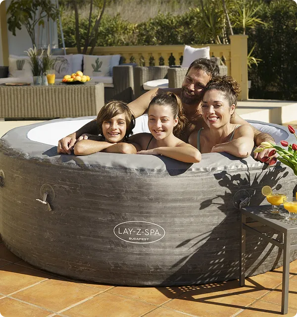 A family enjoying in LAY-Z-SPA Tub