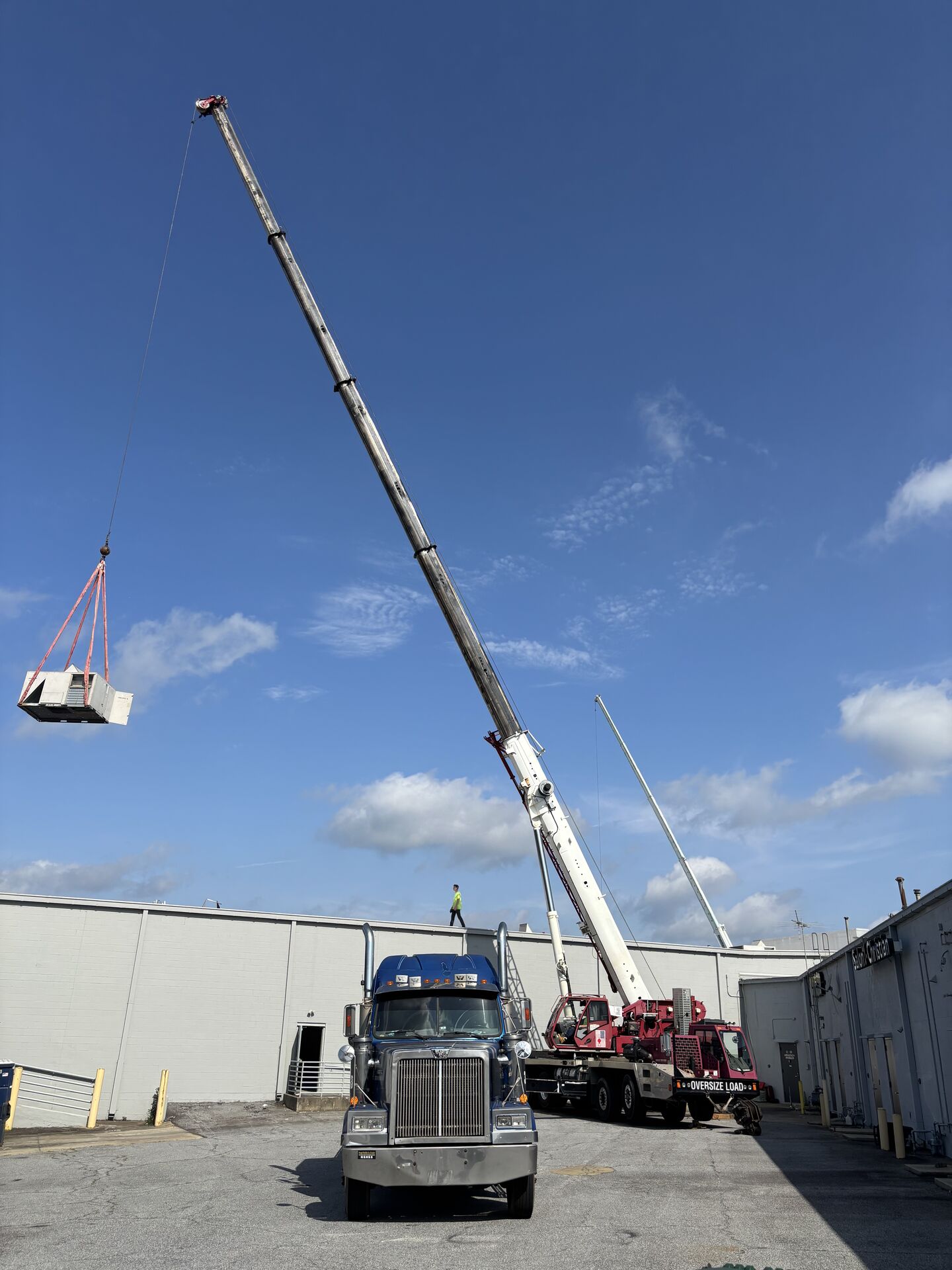 Crane working at an apartment construction site