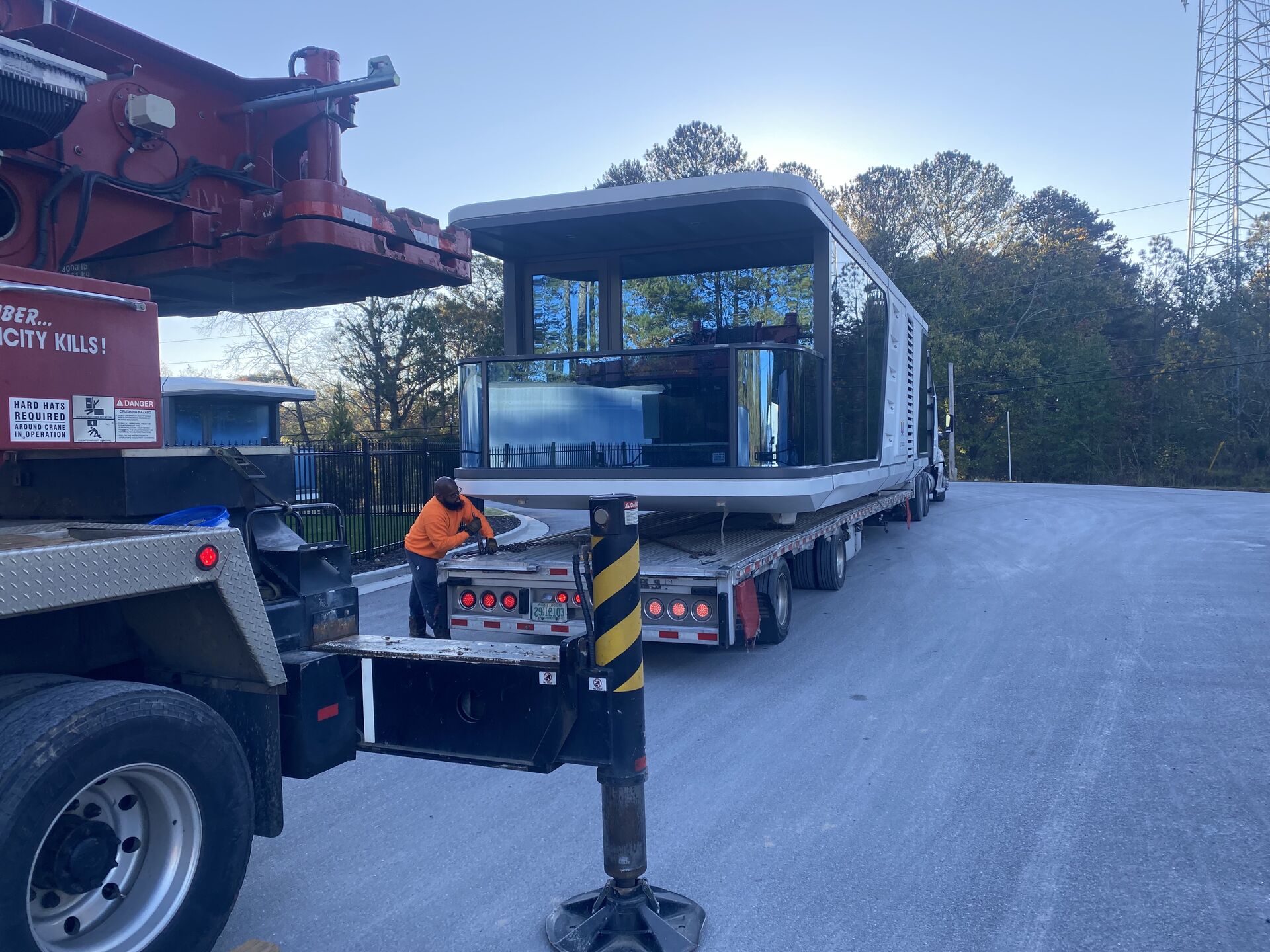 Heavy haul transport with crane staging