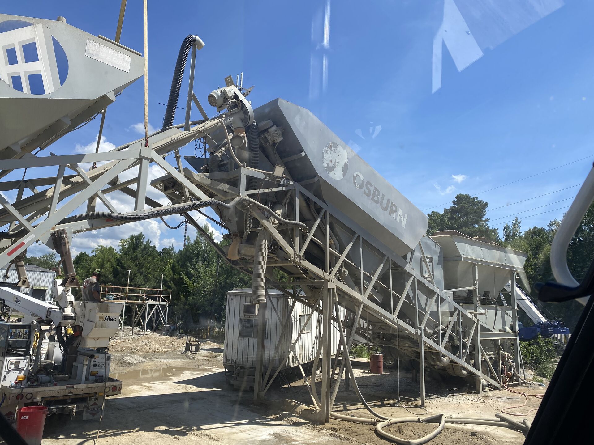 Crane lifting steel during structural erection