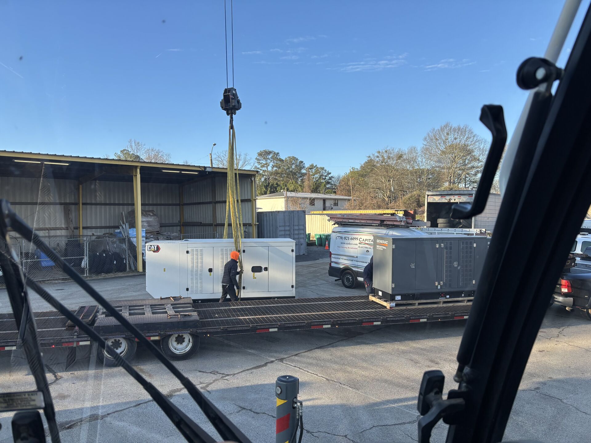 Crane lifting an HVAC unit