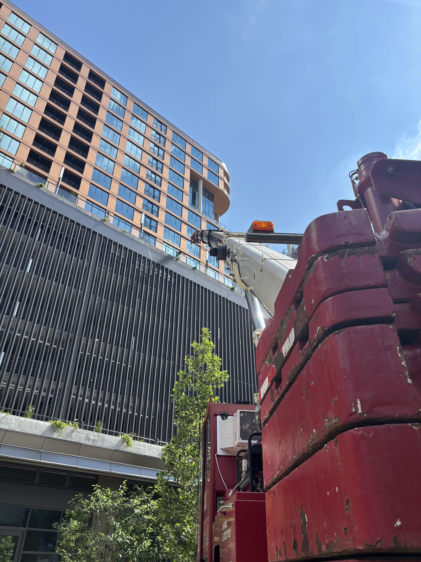 Crane working at a high-rise construction site