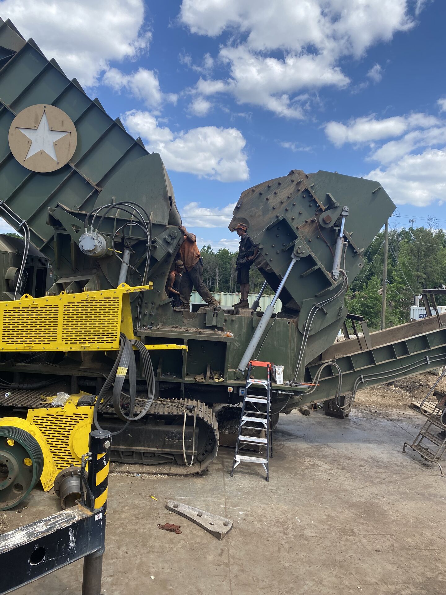 Boom truck handling heavy machinery