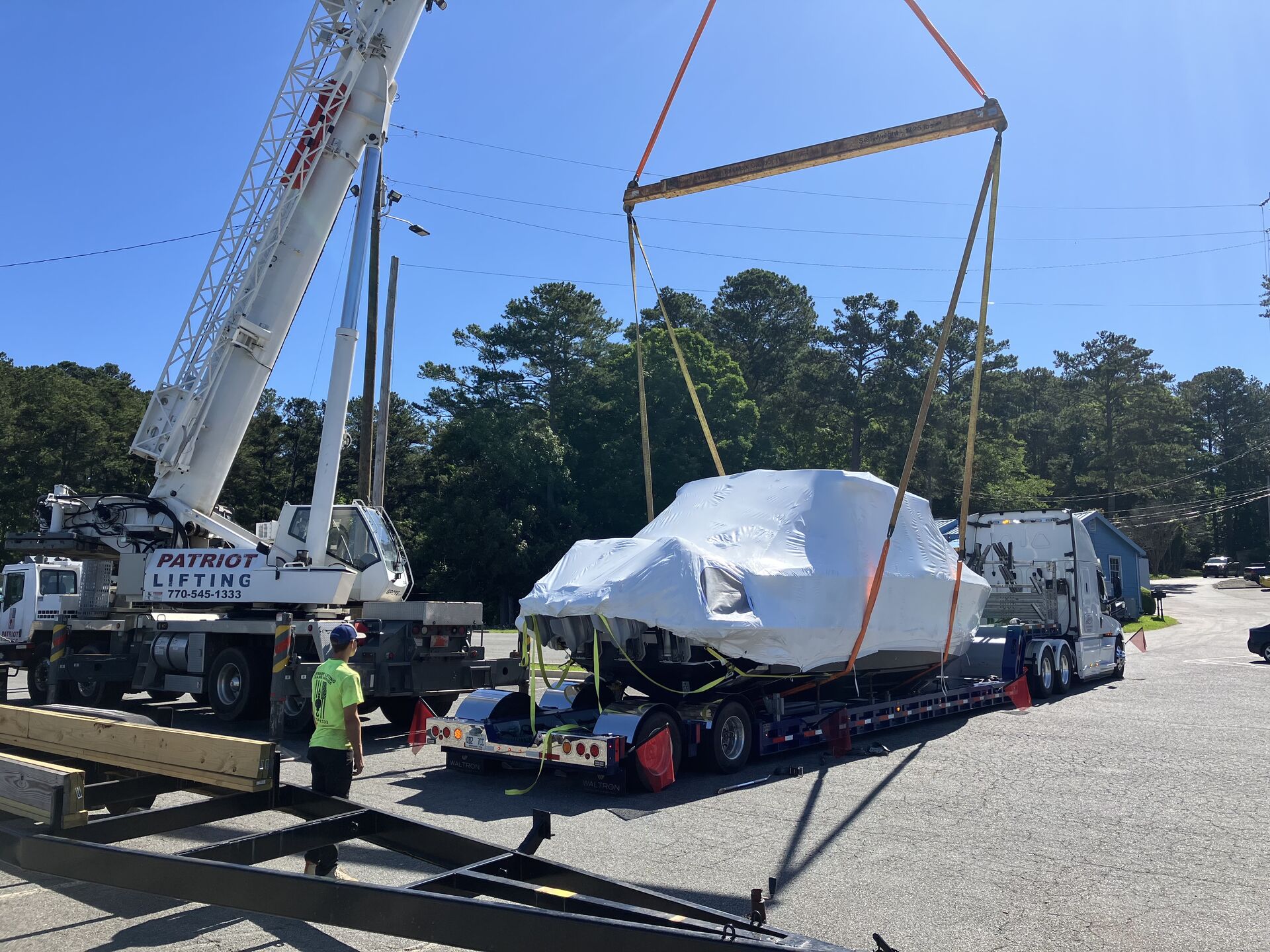Engineered rigging in progress on a crane lift