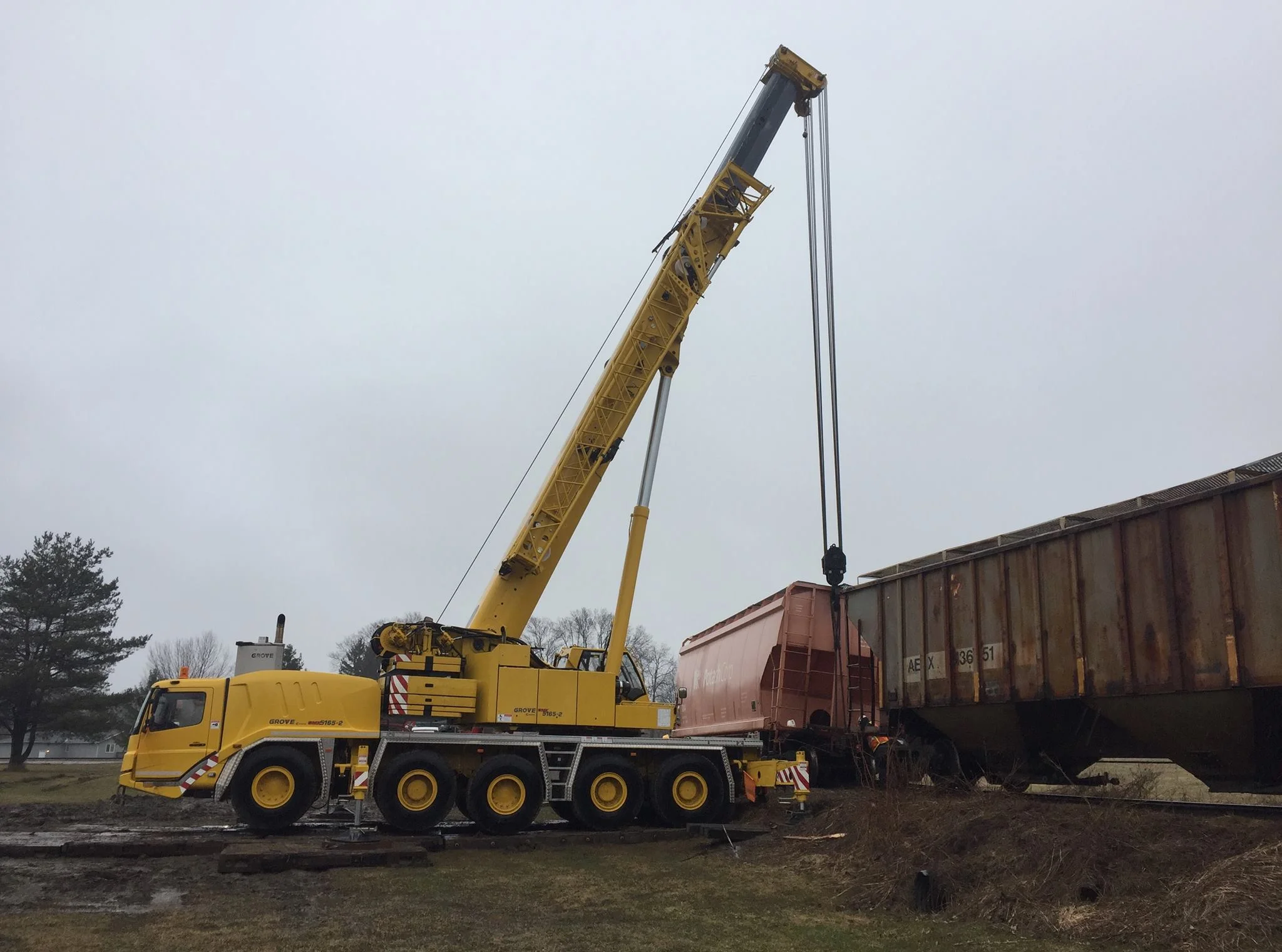 Crane working at a rail facility