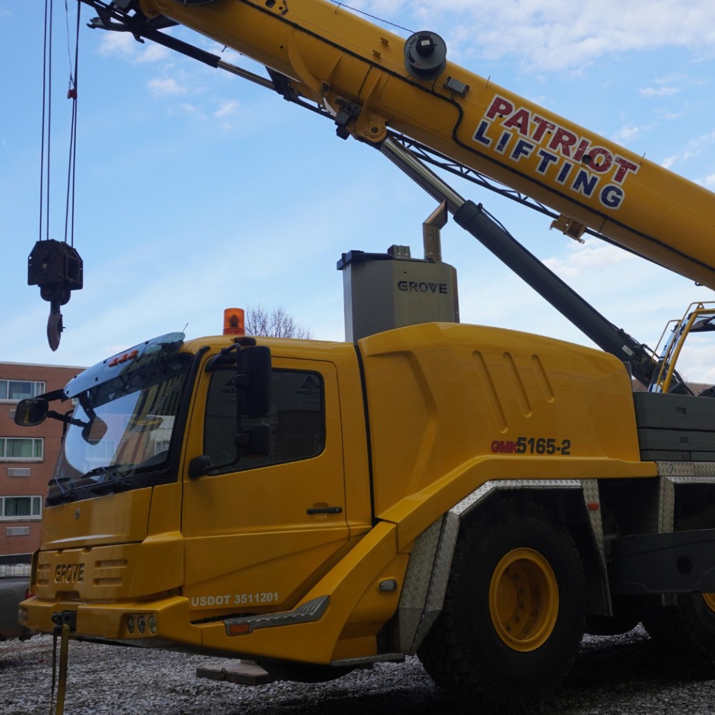 Patriot Lifting branded Grove GMK5165-2 at a downtown apartment construction site
