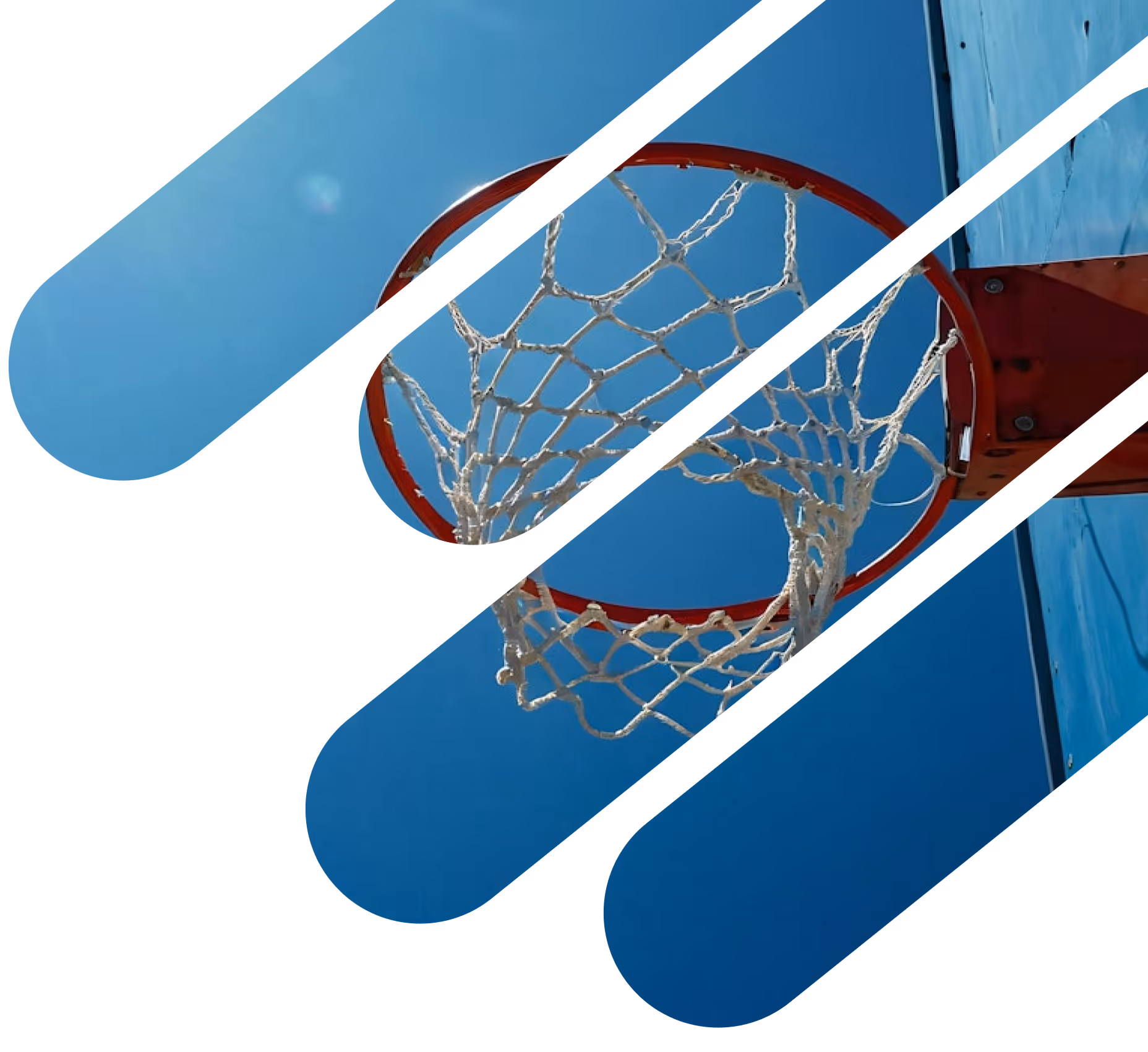 Upward view of a basketball hoop with a white net against a clear blue sky.