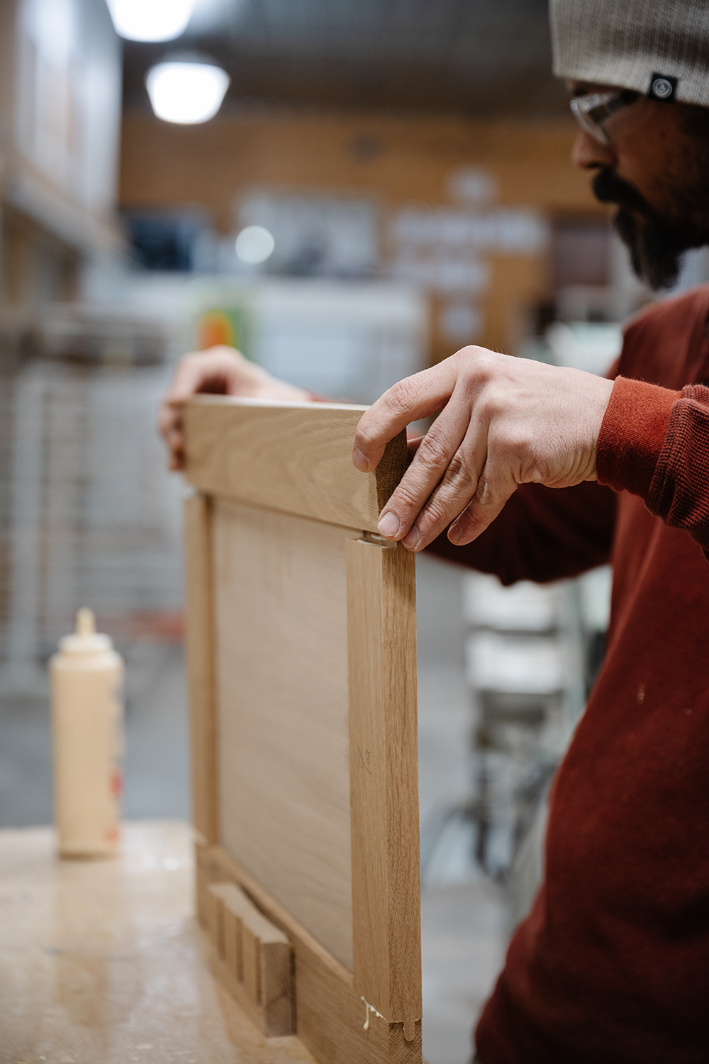 image of craftsman building a custom cabinet frame