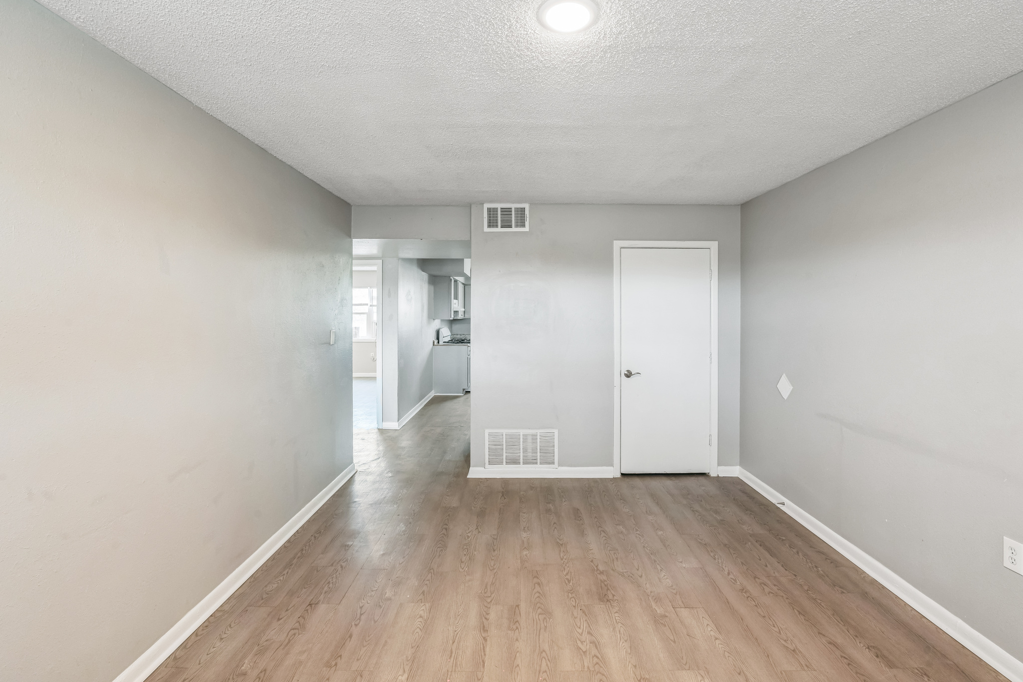 Bedroom with wood floors