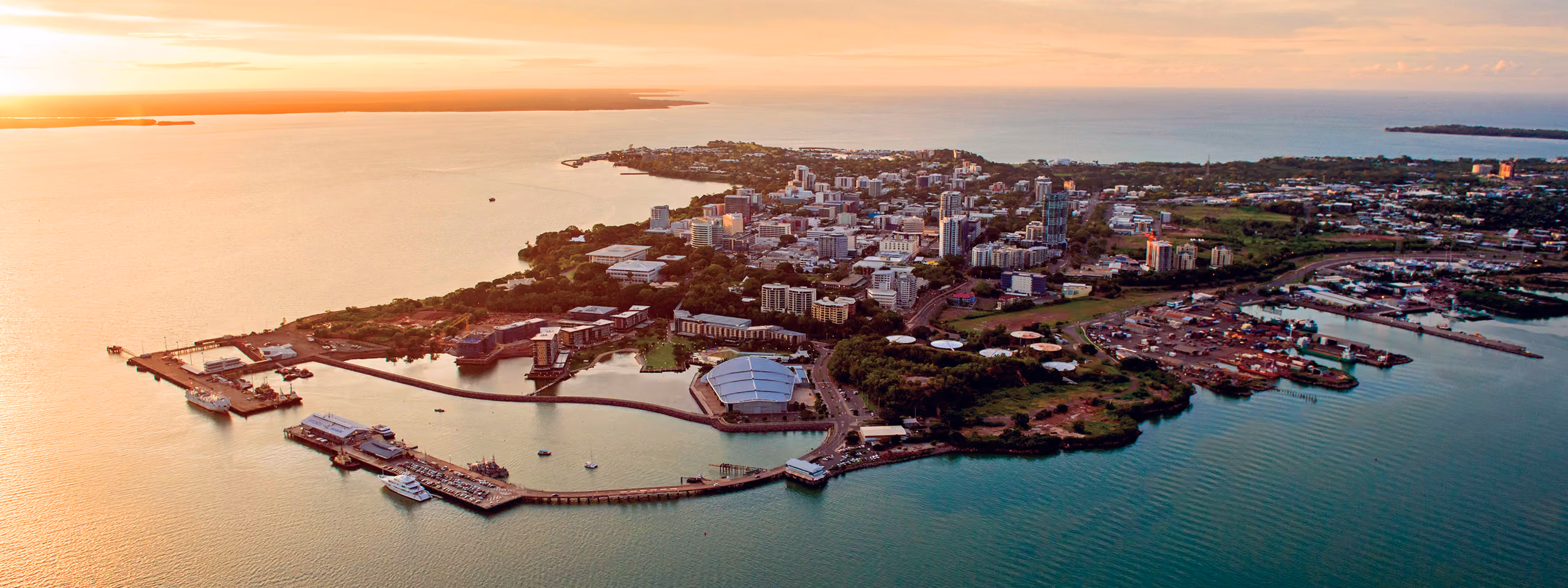 Aerial view of Darwin city and harbour at sunset.