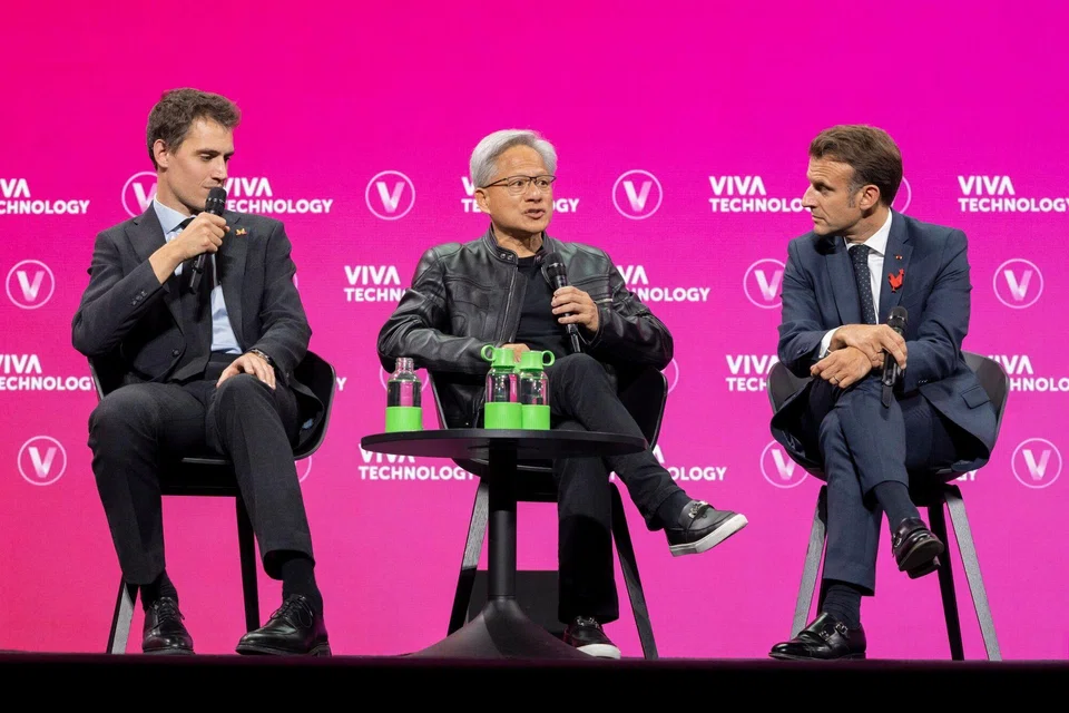 Arthur Mensch of Mistral, Jensen Huang of Nvidia and President Emmanuel Macron at the VivaTech fair in Paris, June 2025
