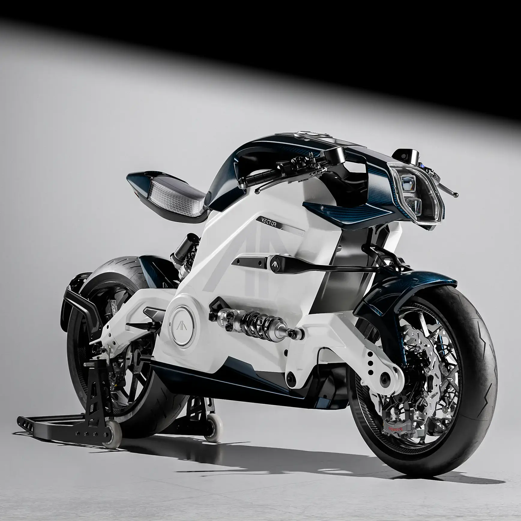 Arc Vector electric motorcycle with white carbon, white monocoque, green carbon top panel and custom finishes