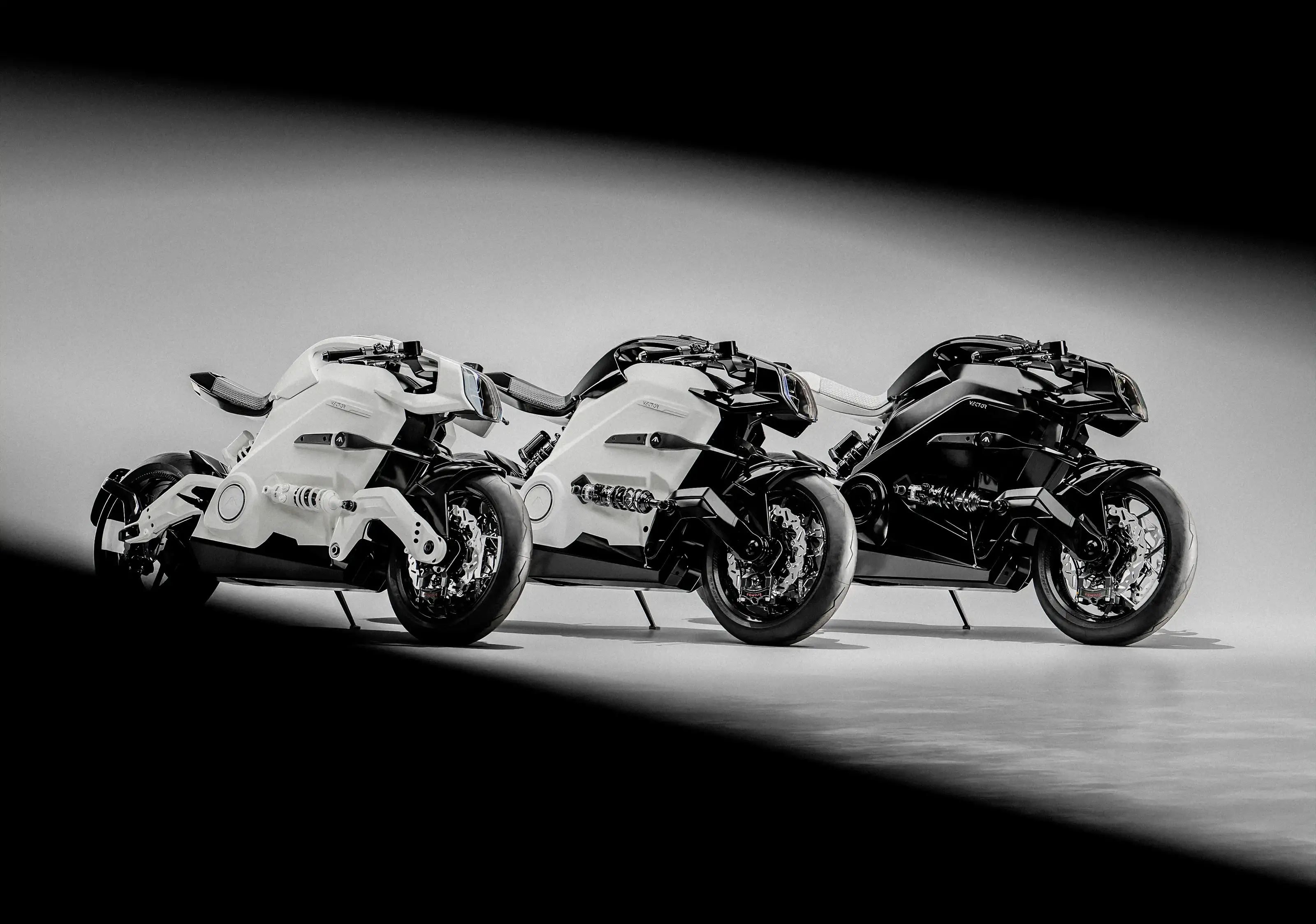 Image of three Arc Vector ghost Edition with black and white livery
