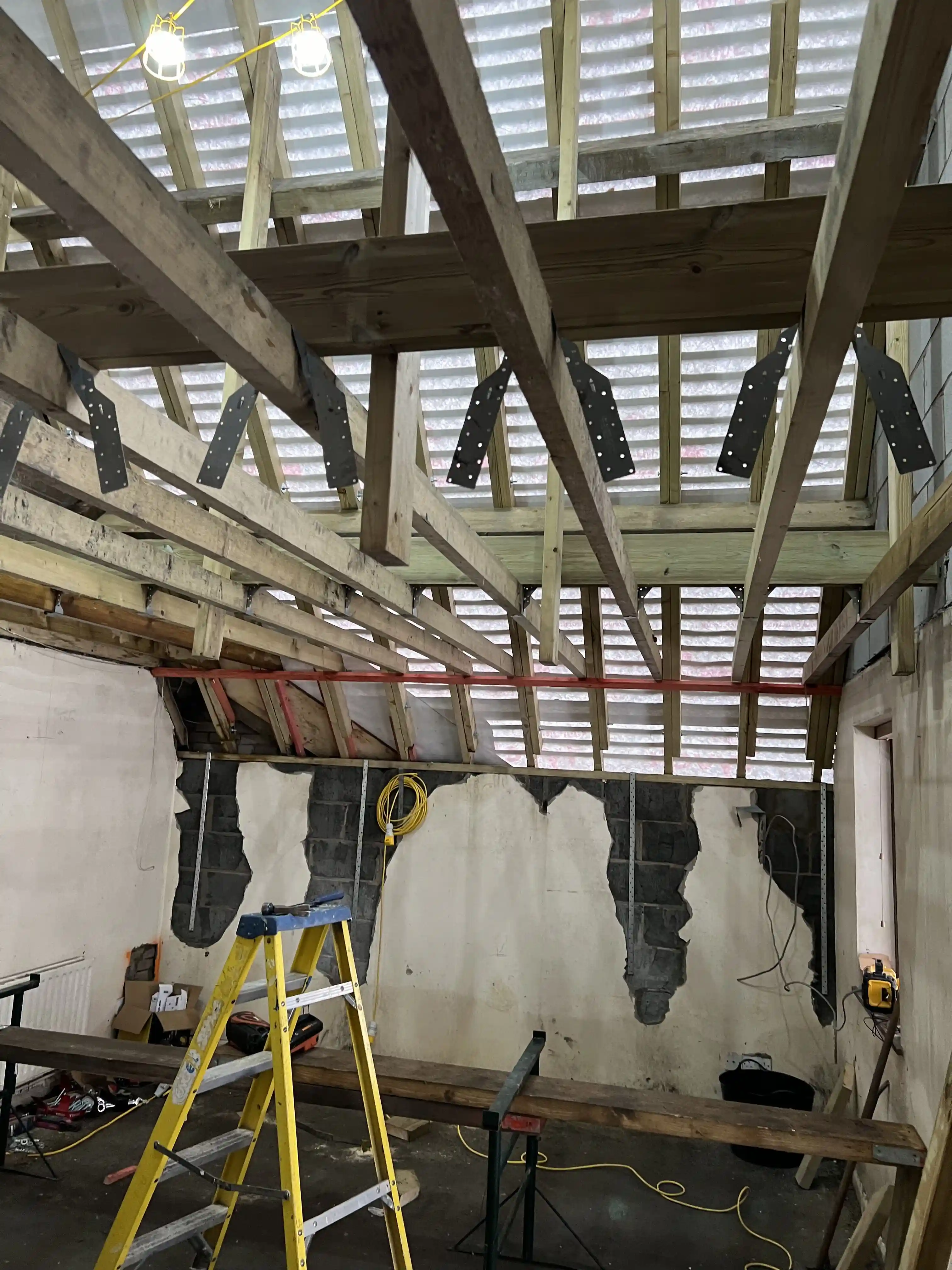 New roof structure inside the Swiss Chalet at Glen Helen under a temporary roof