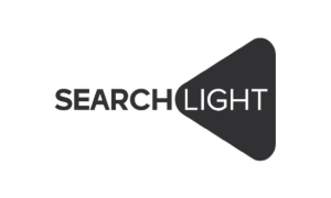 Logo with the word SEARCH in black uppercase letters, followed by the word LIGHT in white uppercase letters inside a black right-pointing triangle shape resembling a spotlight beam.