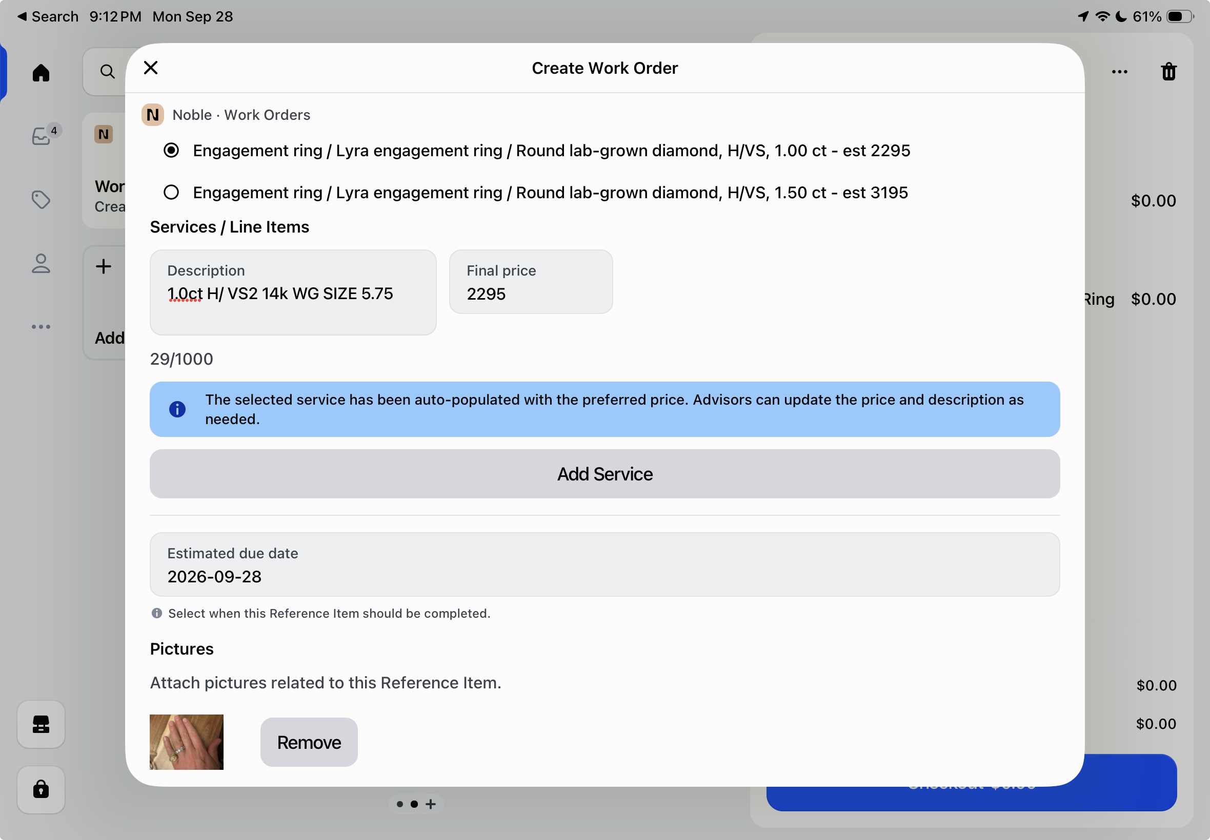 Screen showing 'Create Work Order' interface with options for two Lyra engagement rings featuring round lab-grown diamonds; one 1.00 ct priced at 2295 and one 1.50 ct at 3195. A service line item is selected with description '1.0ct H/VS2 14k WG SIZE 5.75' and final price 2295. A note indicates pricing is auto-populated and editable. Estimated due date is 2026-09-28. Attached is a small picture thumbnail of a hand wearing the ring, with an option to remove the picture.