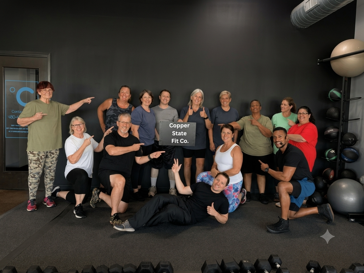 Team of Fit Body Boot Camp Arizona trainers smiling and ready to help members