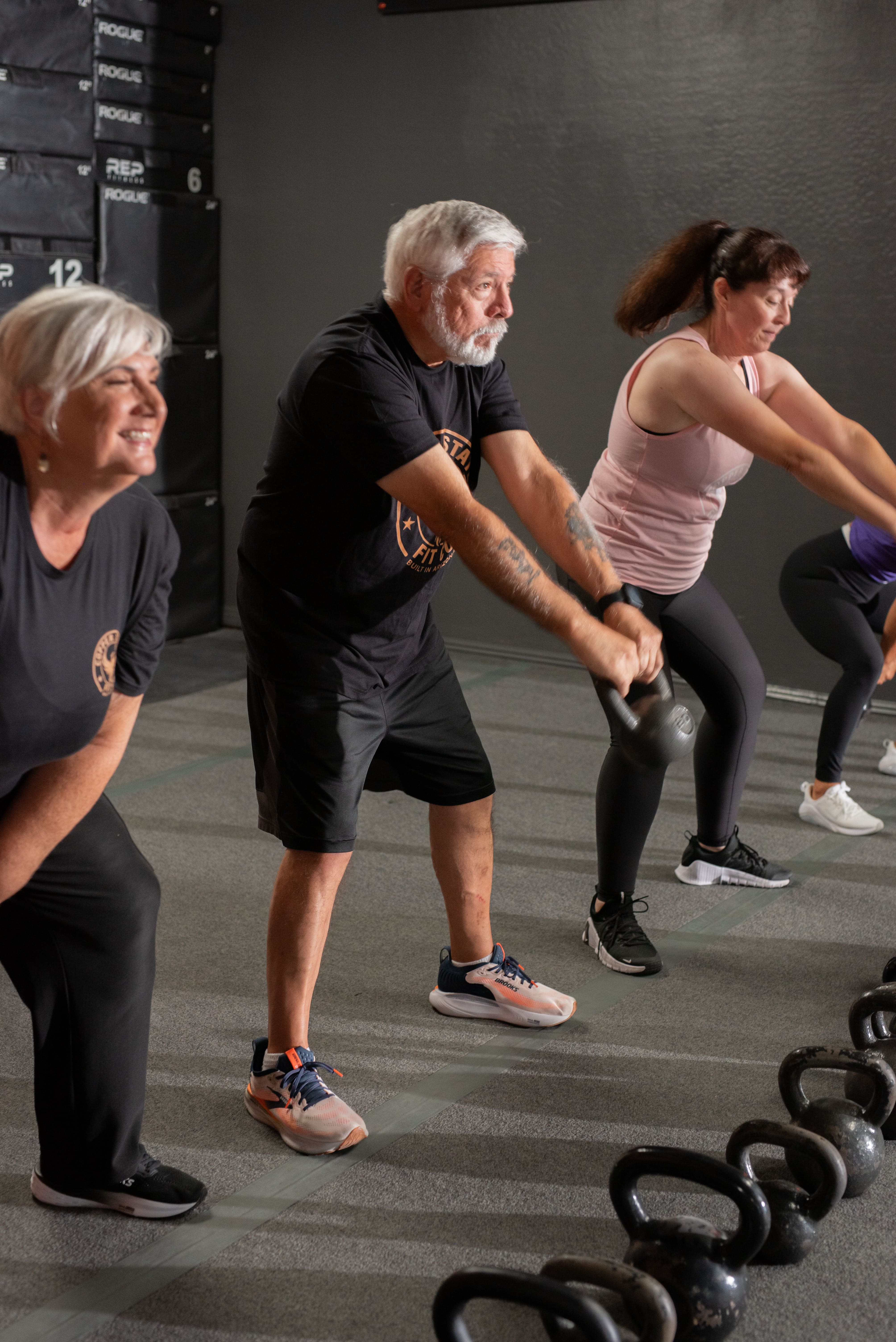 Supportive fitness community training together at Fit Body Boot Camp Arizona