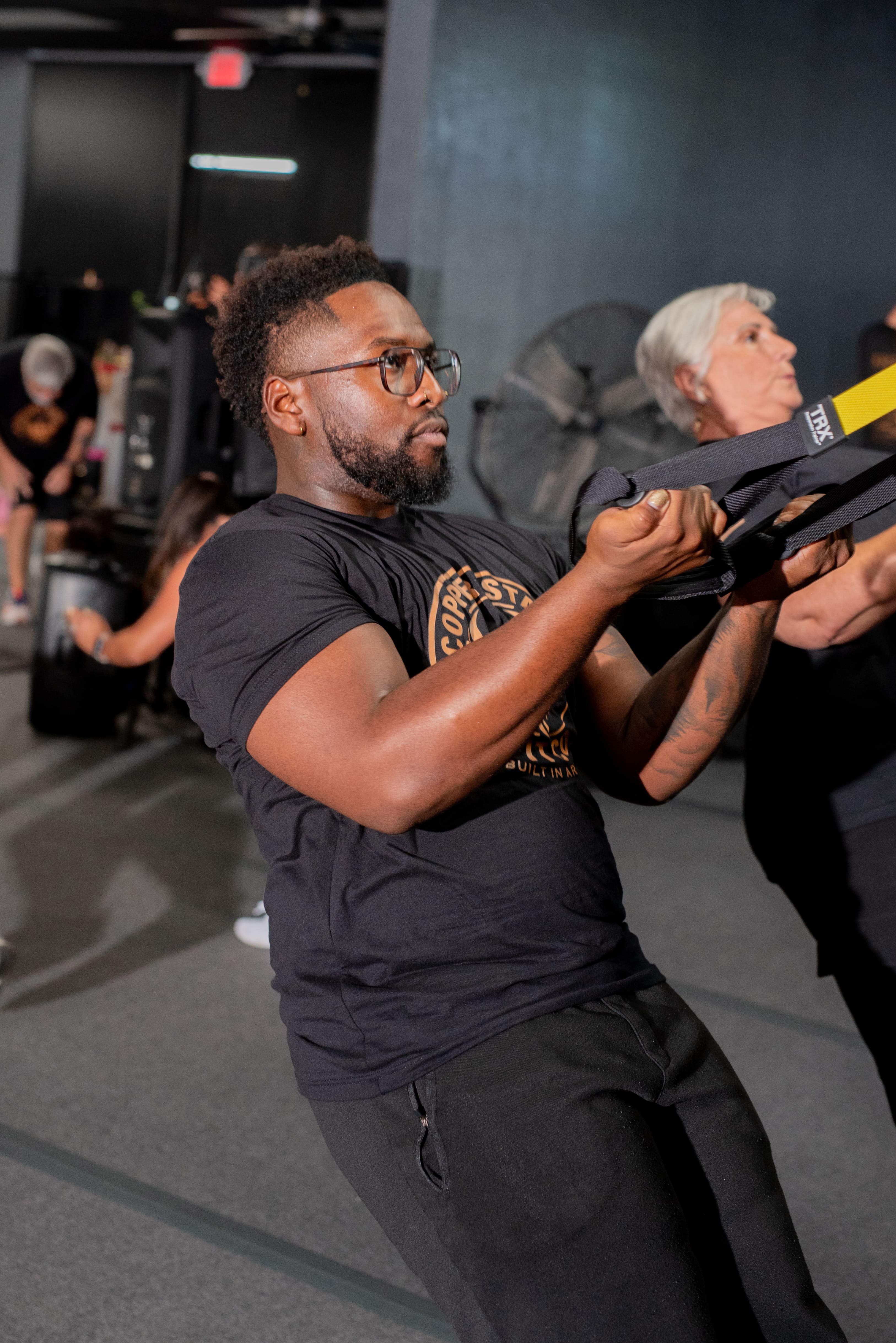 Yoga and recovery class for flexibility and injury prevention at Fit Body Boot Camp Arizona