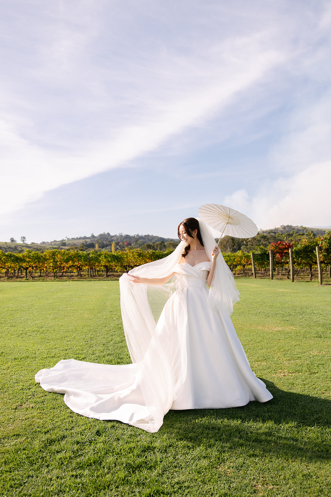 A couple celebrating with their guests, photographed by Studio Musu