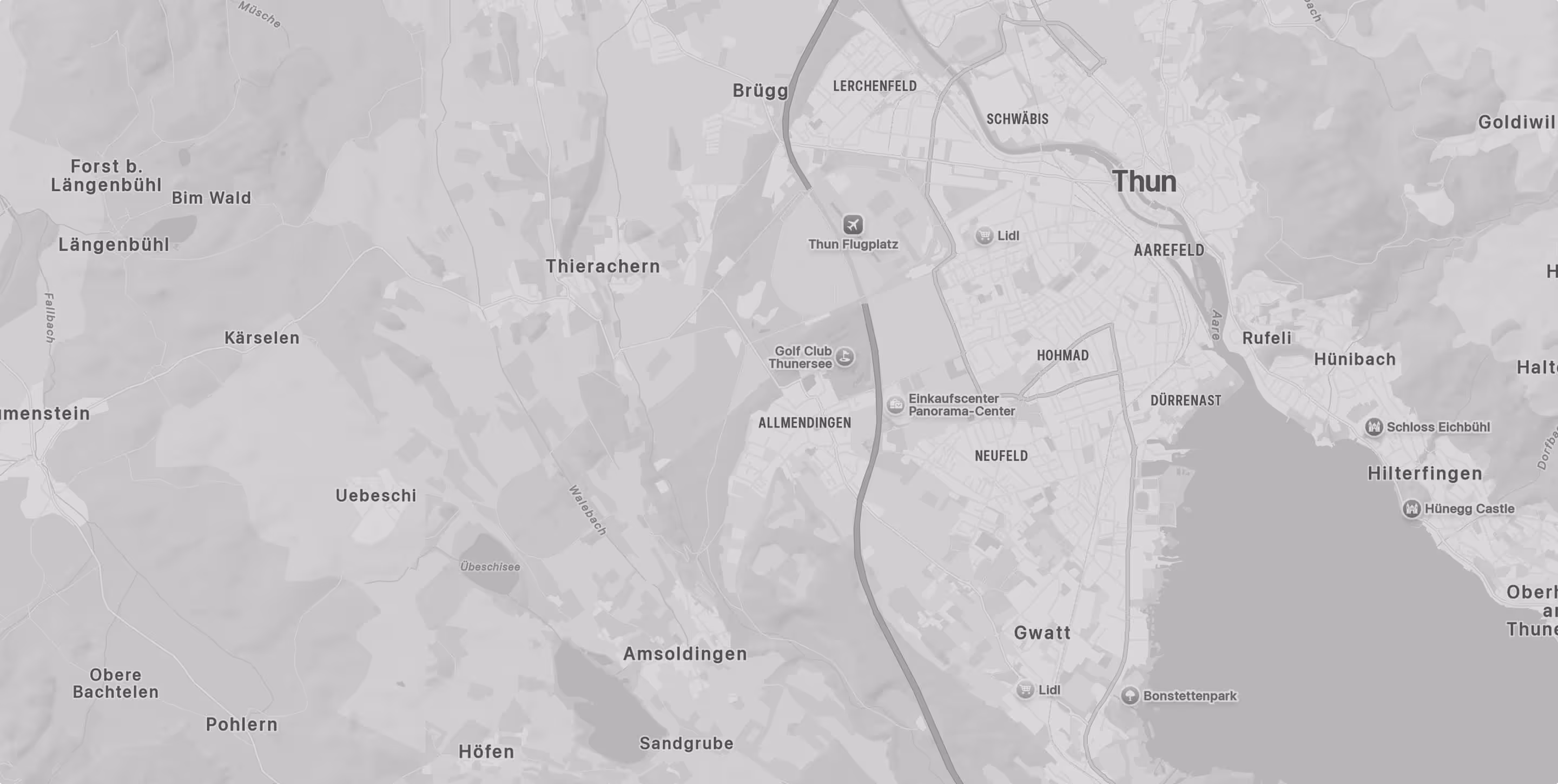 Map of Thun area in Switzerland, showing towns, castles, parks, golf, and shopping centers.