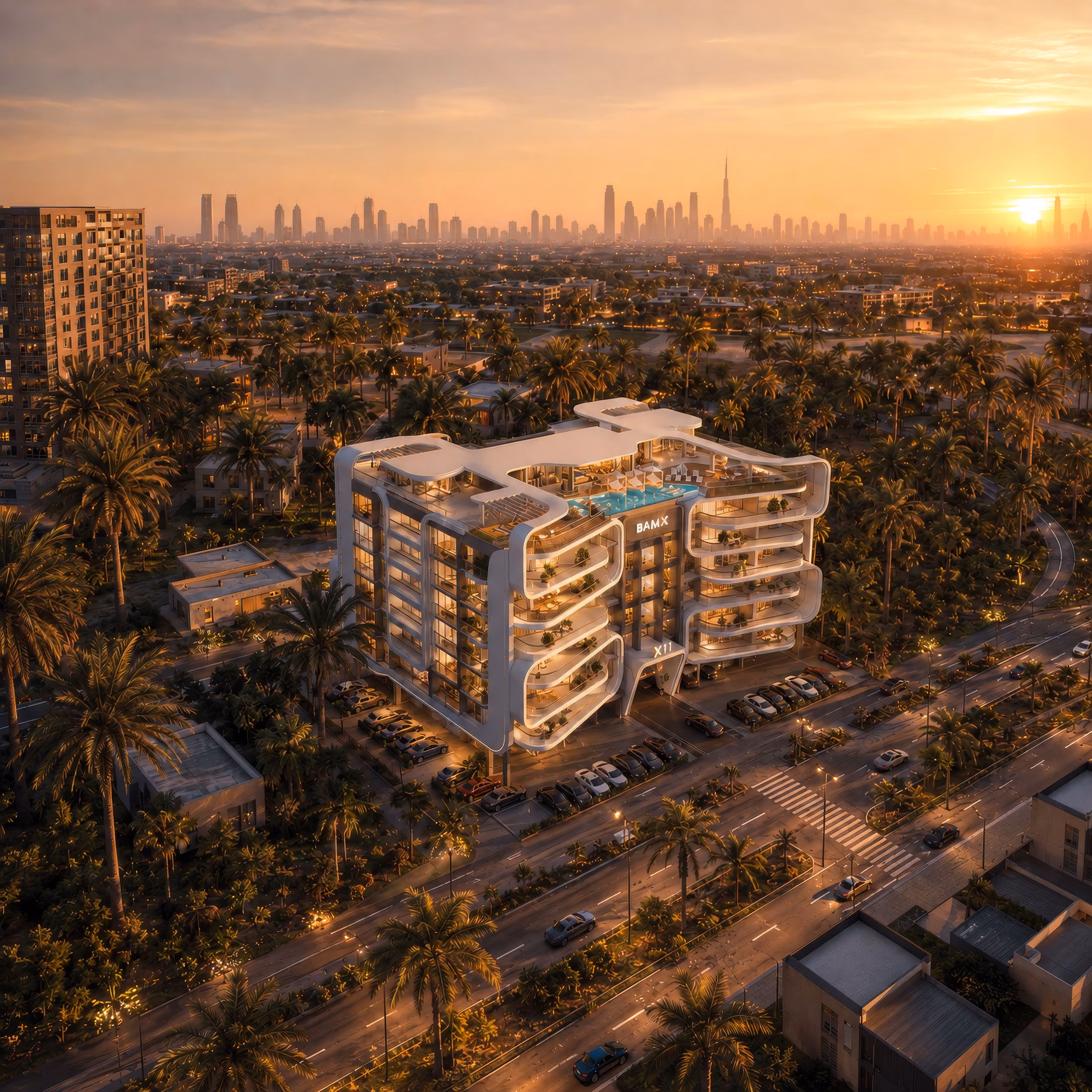 Modern multi-story residential building with rooftop pool and curved balconies, surrounded by palm trees and situated on a busy road at sunset, with a city skyline in the background.