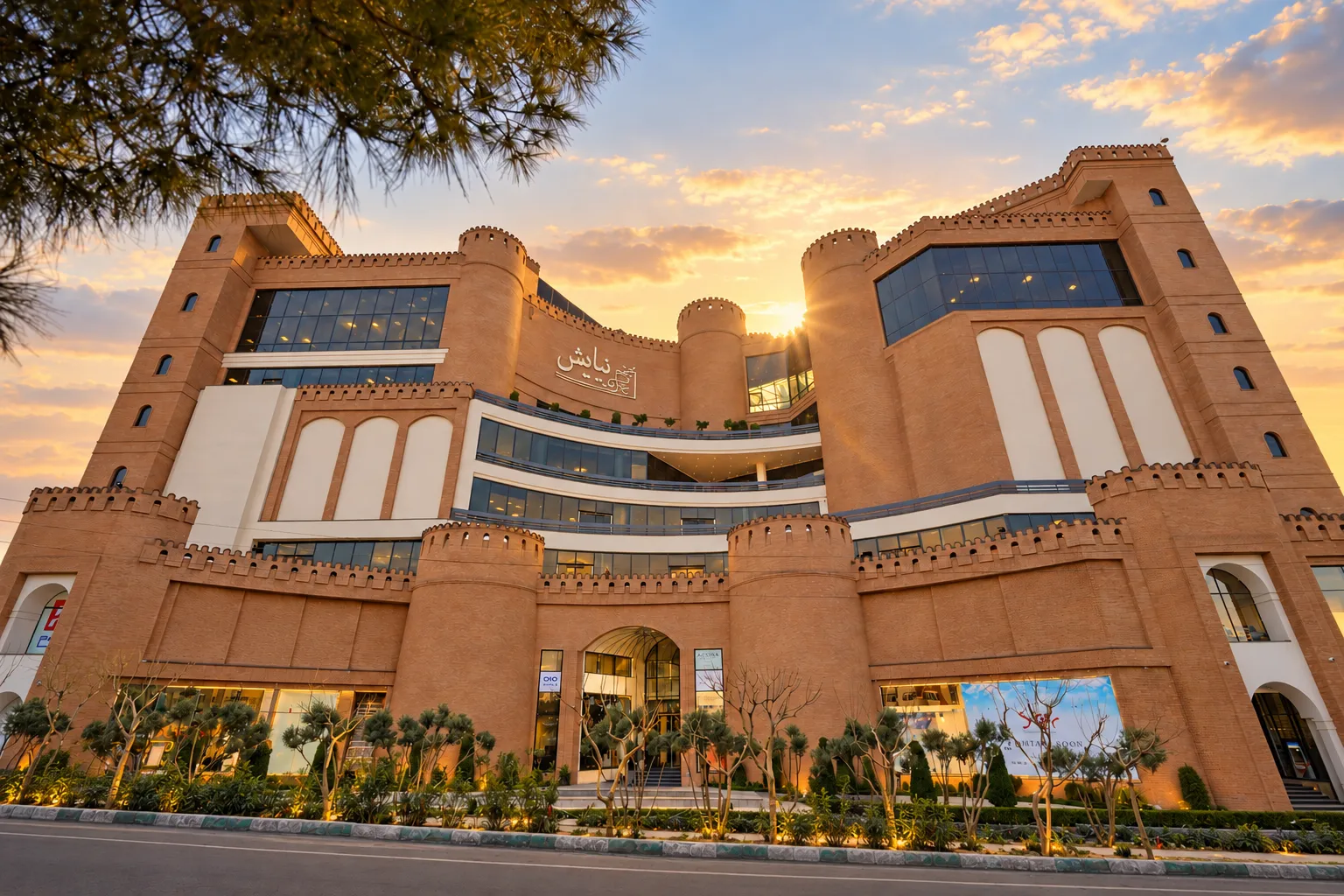 BAMX commercial plaza and mountain landscape at sunset