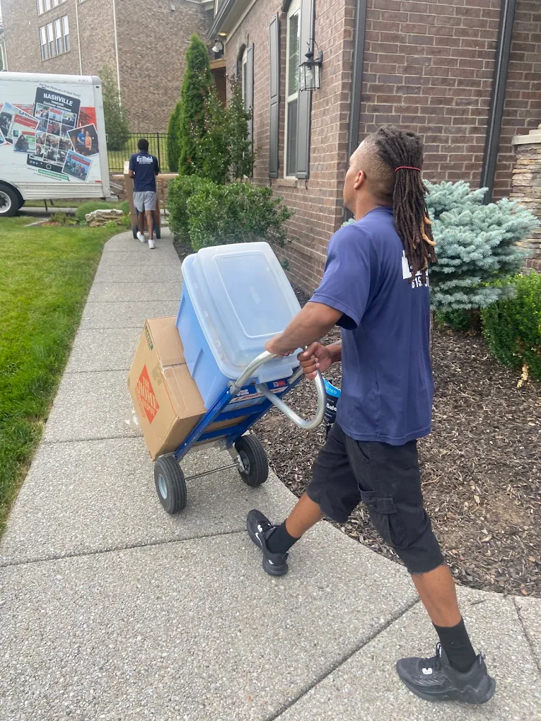image of moving crew with equipment