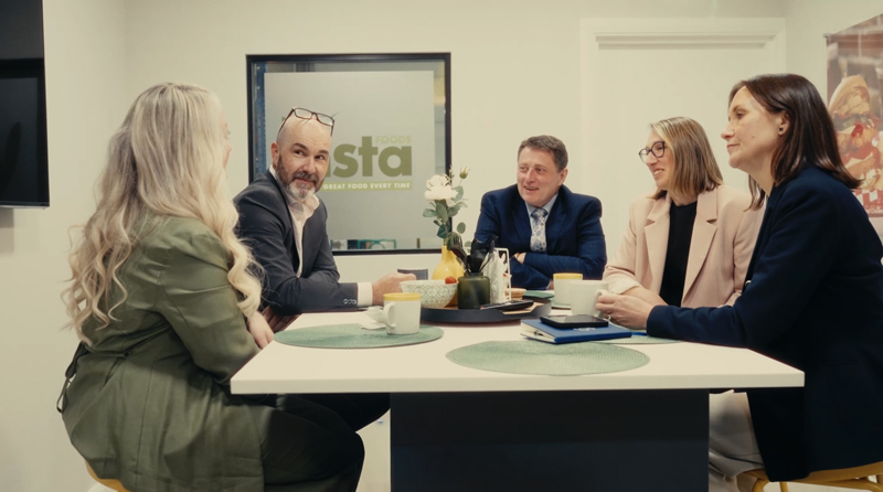 Vista Foods team members in a business meeting