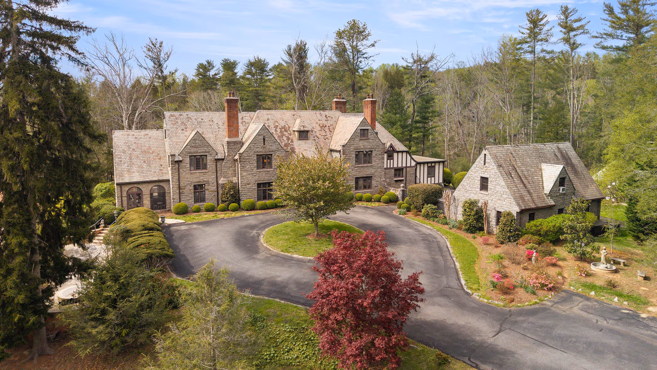 Front of large estate with stone house