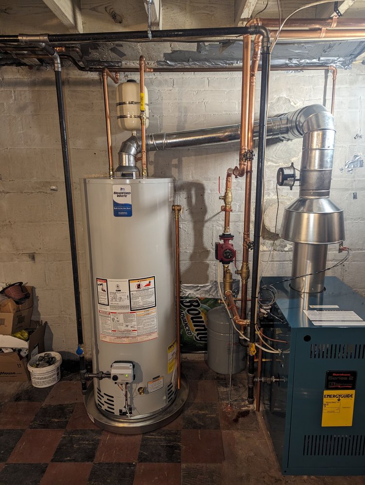 Boiler and water heater venting work in Upper Northwest DC by Tim Whistler Plumbing