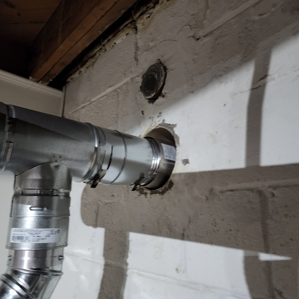 Water heater and furnace chimney liner installation in Kensington MD by Tim Whistler Plumbing