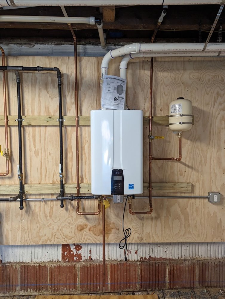Basement repipe and tankless boiler conversion project in Silver Spring MD by Tim Whistler Plumbing