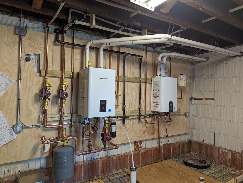 Basement repipe and tankless boiler conversion project in Silver Spring MD by Tim Whistler Plumbing