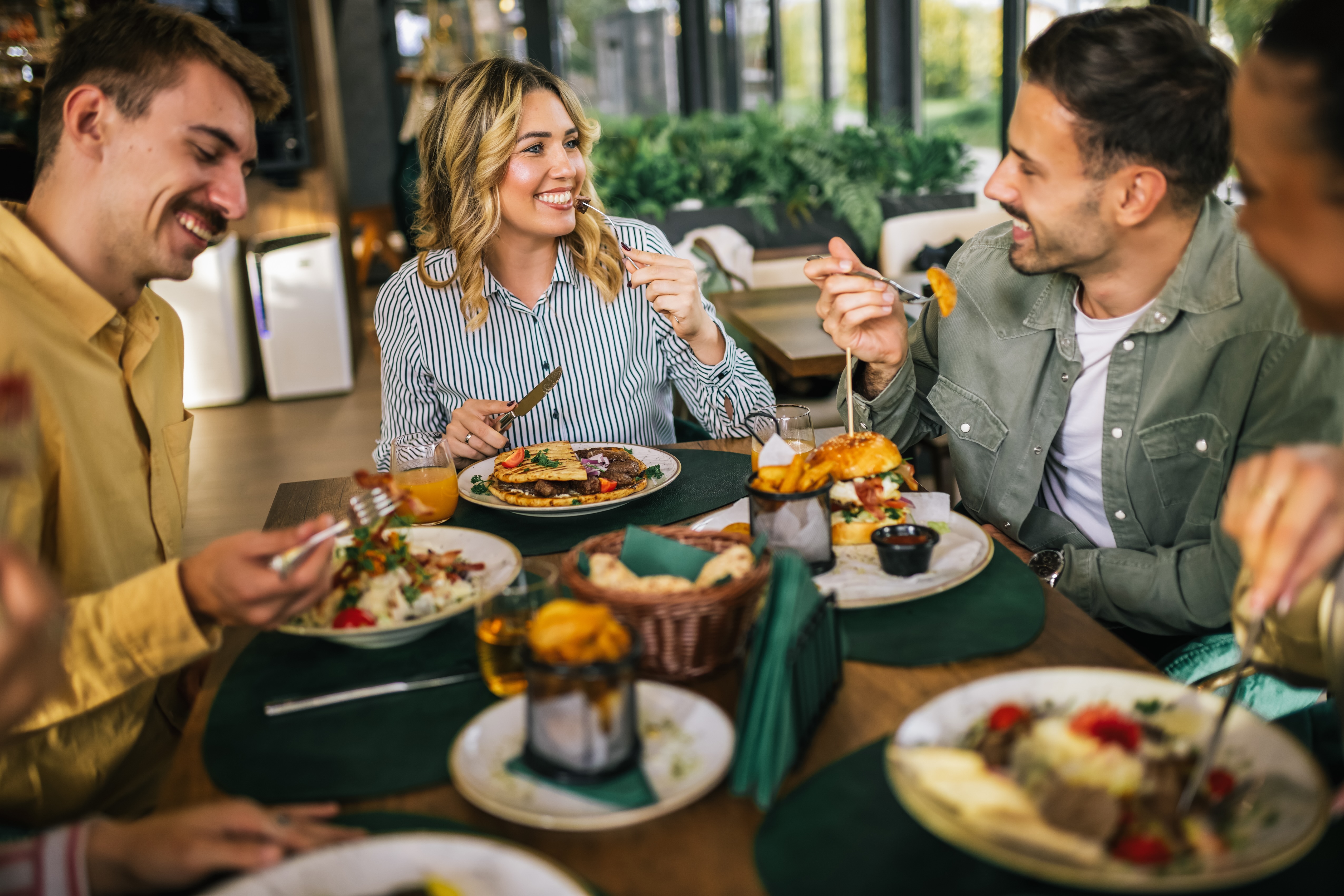 Friends eating stock photo