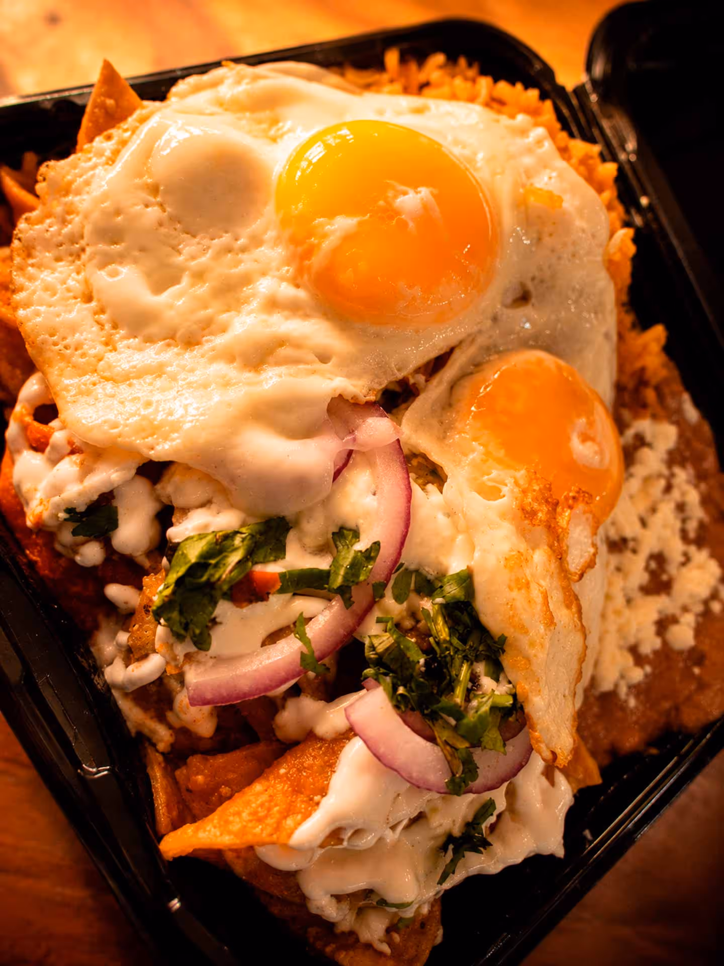 A taco with a fried egg on top.