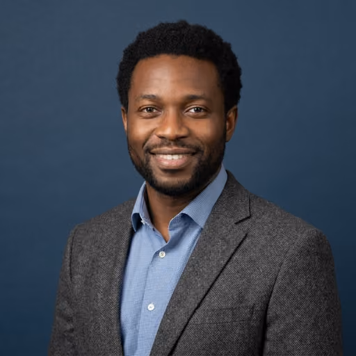 A headshot of David Okafor.