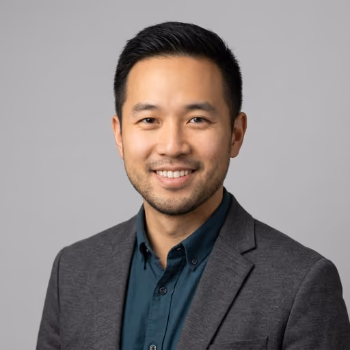 A headshot of Marcus Chen.