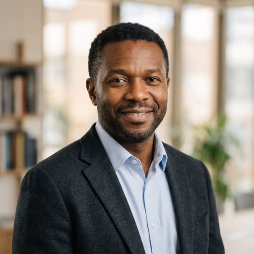 A headshot of Marcus Okonkwo.