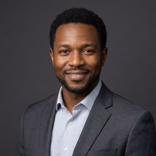 A headshot of Marcus Okafor.